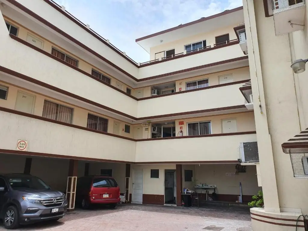 Hotel Atlantico building and private parking